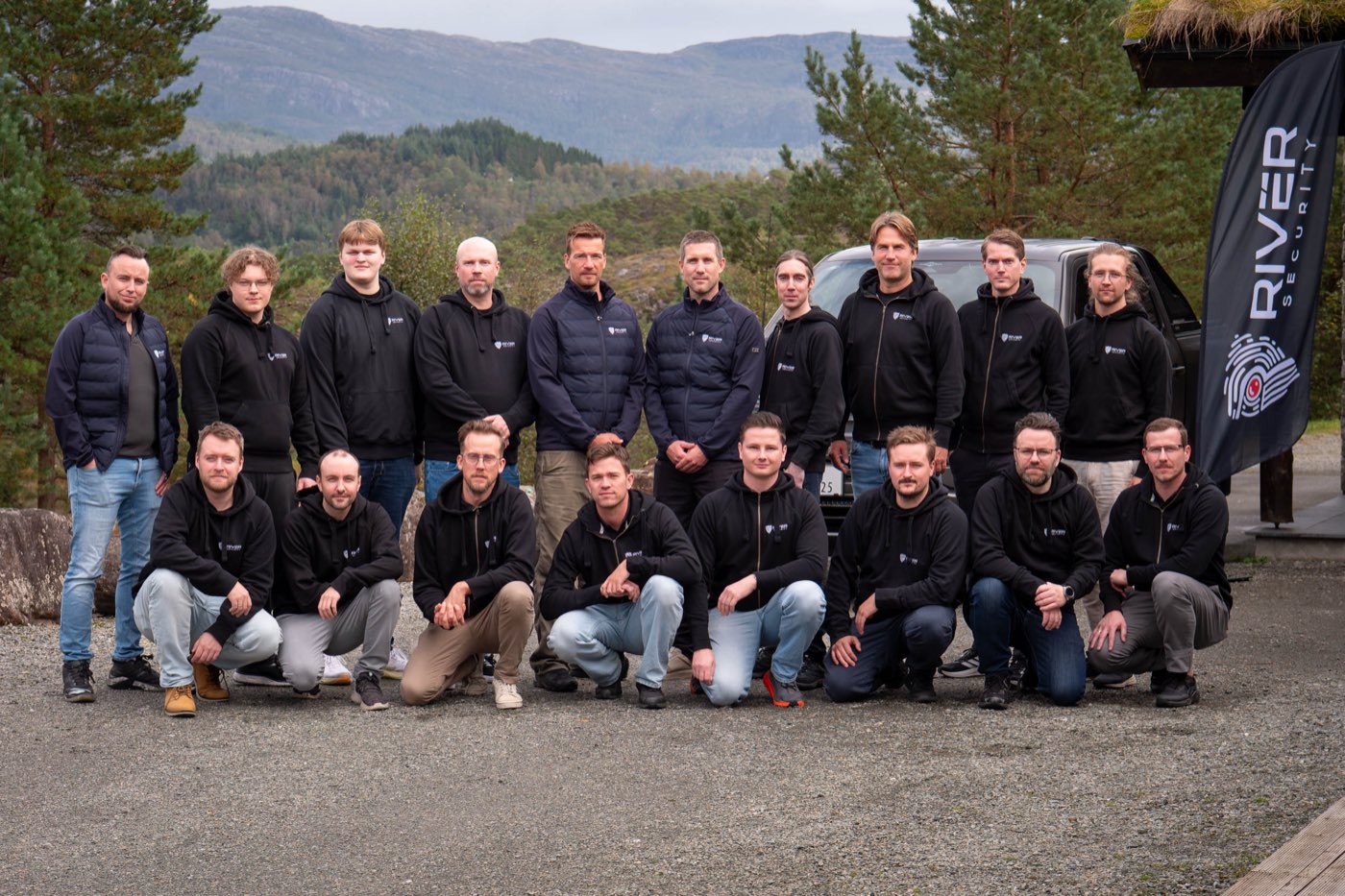 The River Security team gathered outdoors at Eikelandsosen